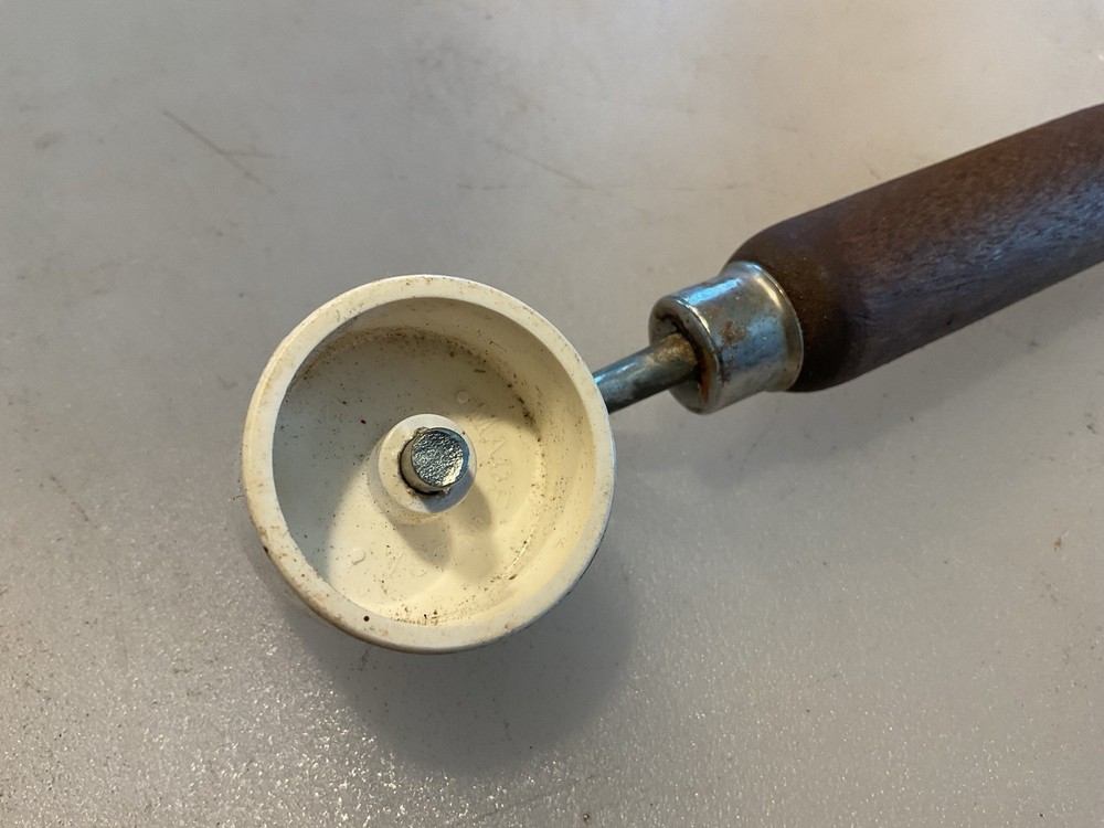Warner 422 1 inch plastic roller with wood handle Used