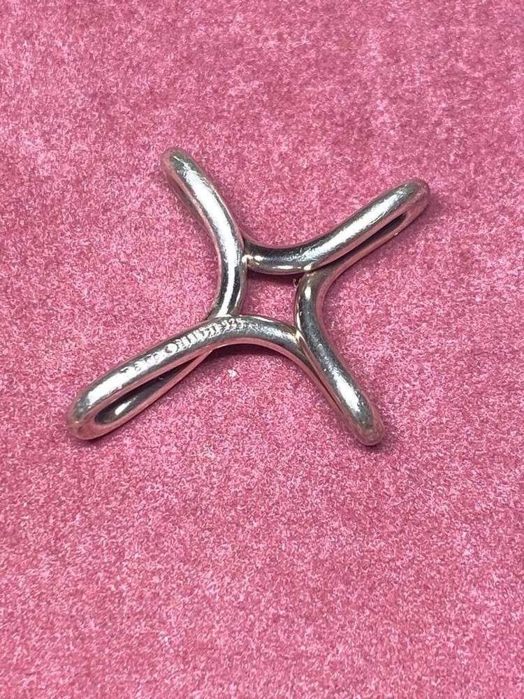 Cross-shaped necklace component, Tiffany & Co. Infinity Cross