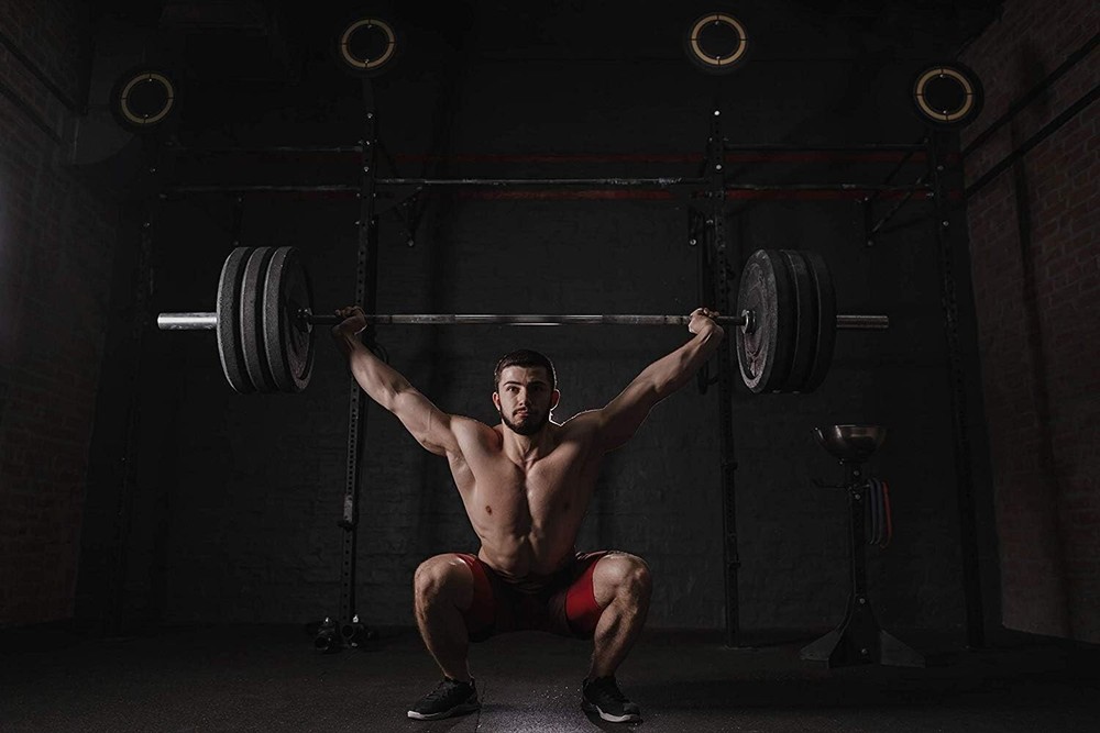 Durable 2-Inch Olympic Barbell Collars with Quick Release for Efficient Lifting