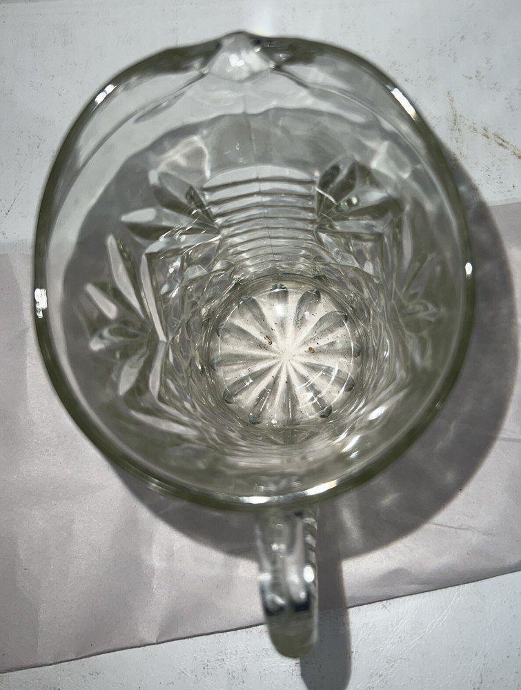 Cut glass pitcher 5 1/4" and 3 1/2" Diameter