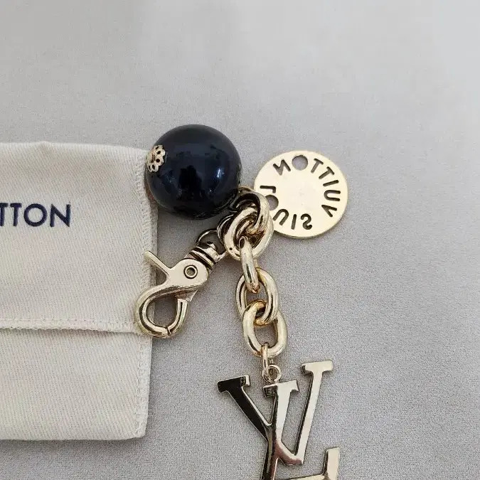 Louis Vuitton Gold LV Keyring - Authentic