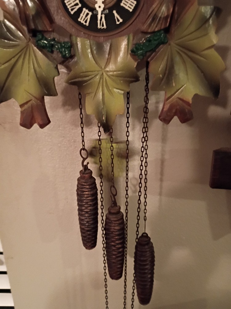 VINTAGE MUSICAL CUCKOO CLOCK WITH CAROUSEL DANCERS.........WORKING......