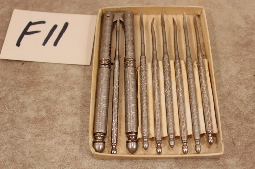 F11 LOT OF VINTAGE CHROME NUTCRACKER & 7 PICKS