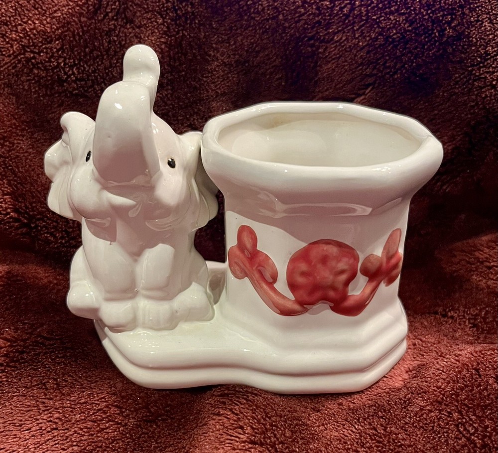 Glazed ceramic elephant planter