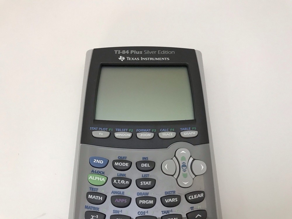 Texas Instruments Ti-84 Plus Silver Edition Graphing Calculator W/ Manual Cables