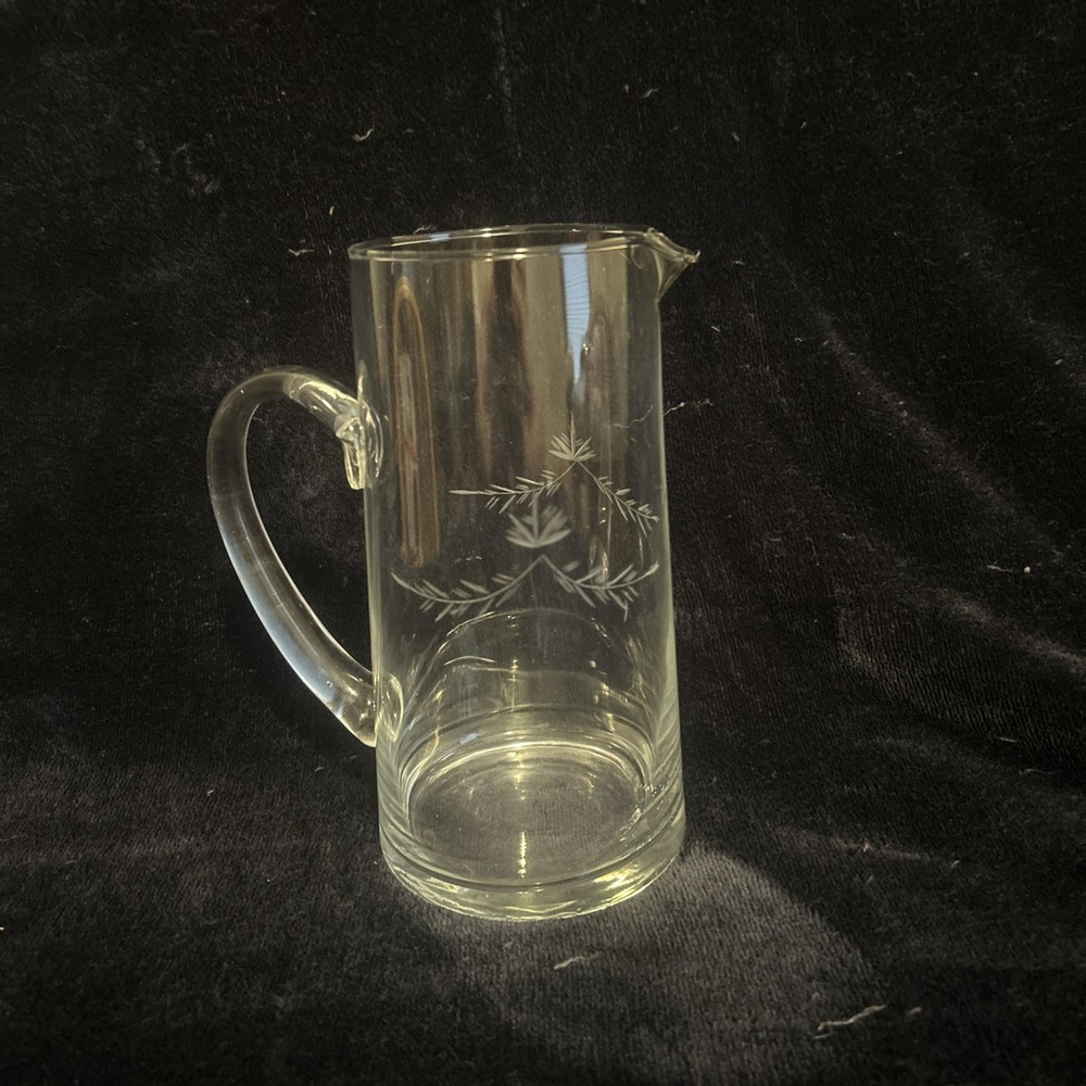 This is a vintage etched glass pitcher with a wheat pattern.