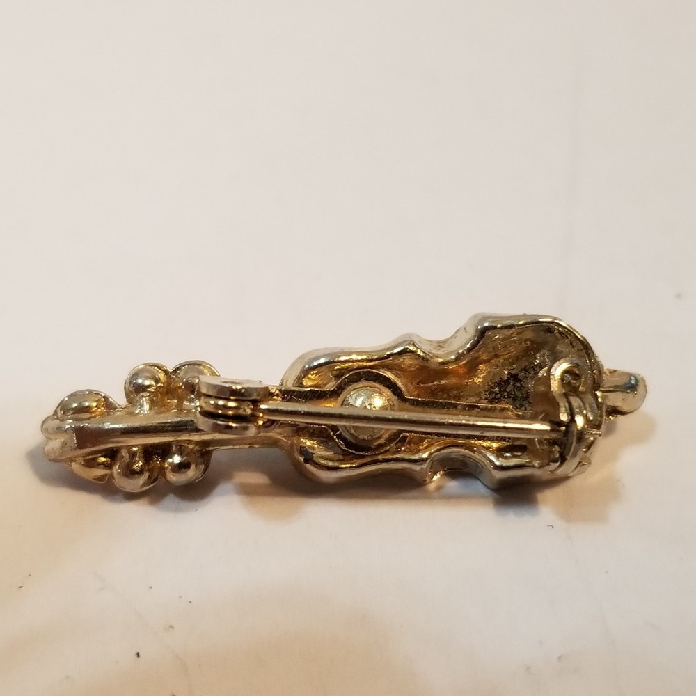 Tiny vintage violin about 1 x 1/4 inch wide missing two stones