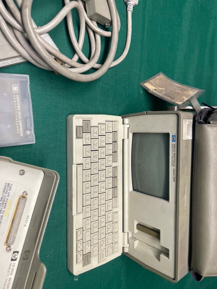 Hewlett Packard HP 4951A protocol analyzer with accessories 18180A interface