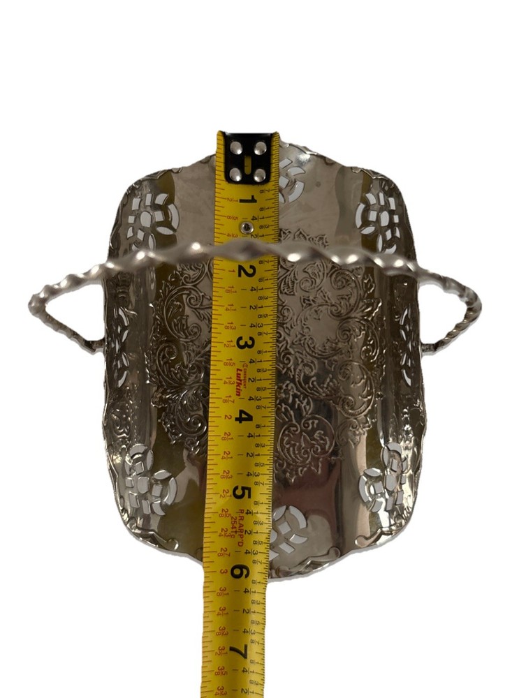 Silvertone metal basket handle w cut outs.