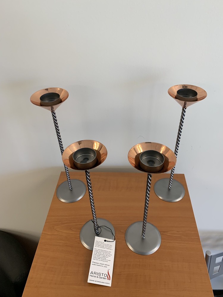 Four Copper Tea candle holders with twisted stem