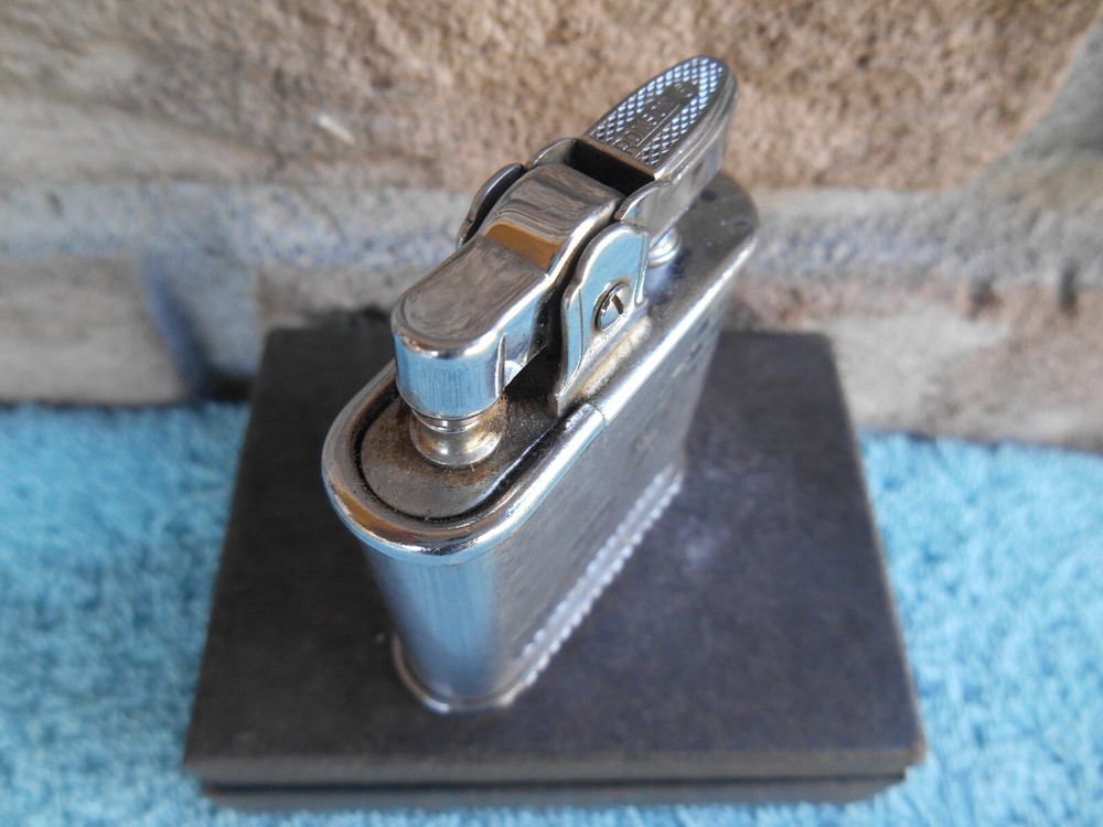 Vintage Ronson WHIRLWIND CHROME CIGARETTE LIGHTER. ETCHED 14TH CENTURY SHIELDS