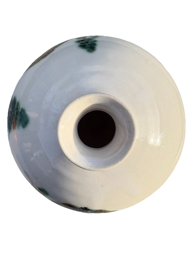 ceramic vase with an "Evergreen" design, featuring a water etching