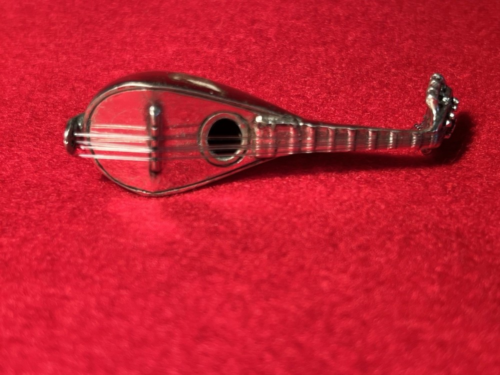 silver miniature 800 mandolin w/ seperate strings