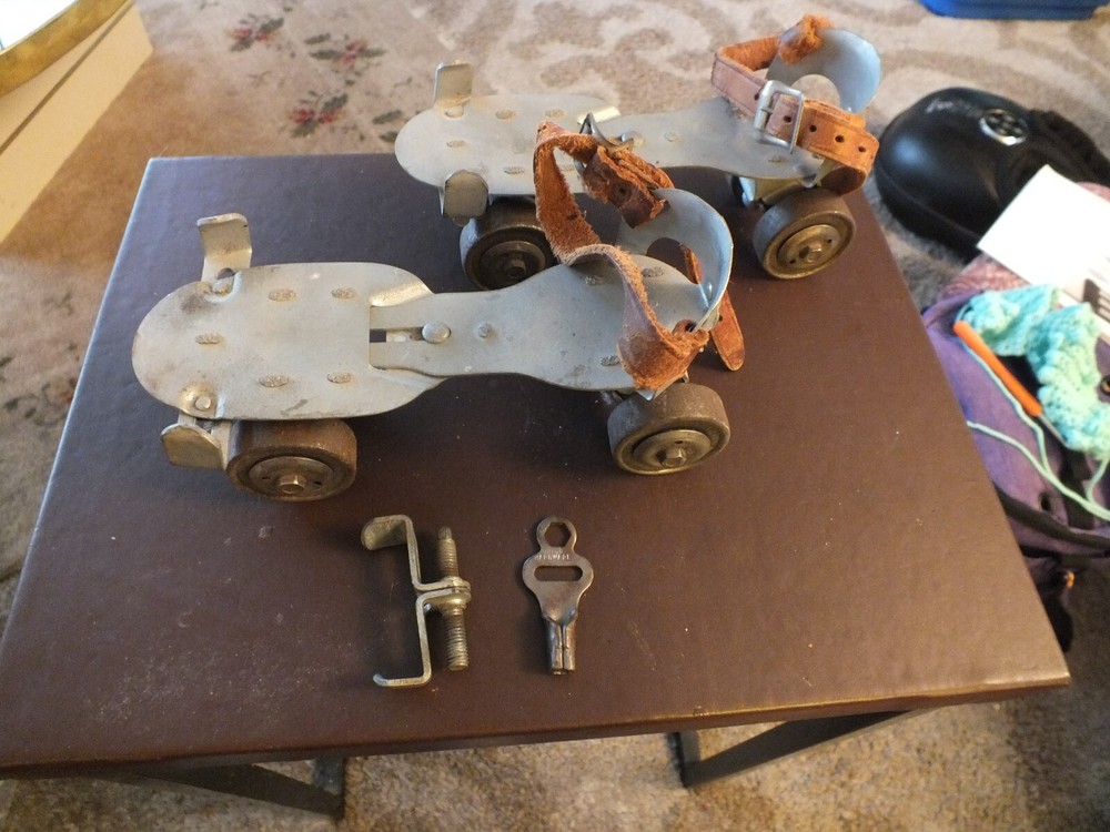 antique roller skates a pair