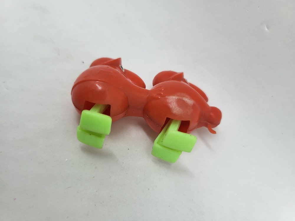 Vintage Minature Red Plastic Goon Walking