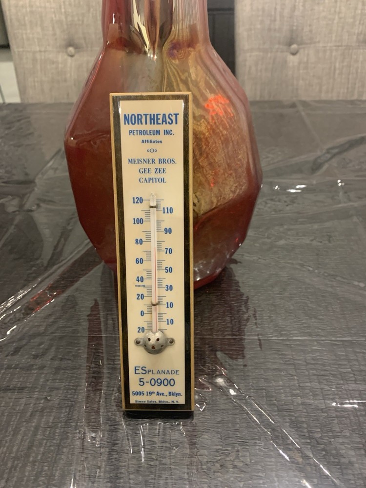 vintage wooden thermometer