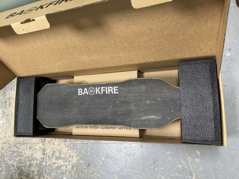 Backfire G2 Black Electric Skateboard With Extra Wheels, Charger & Remote