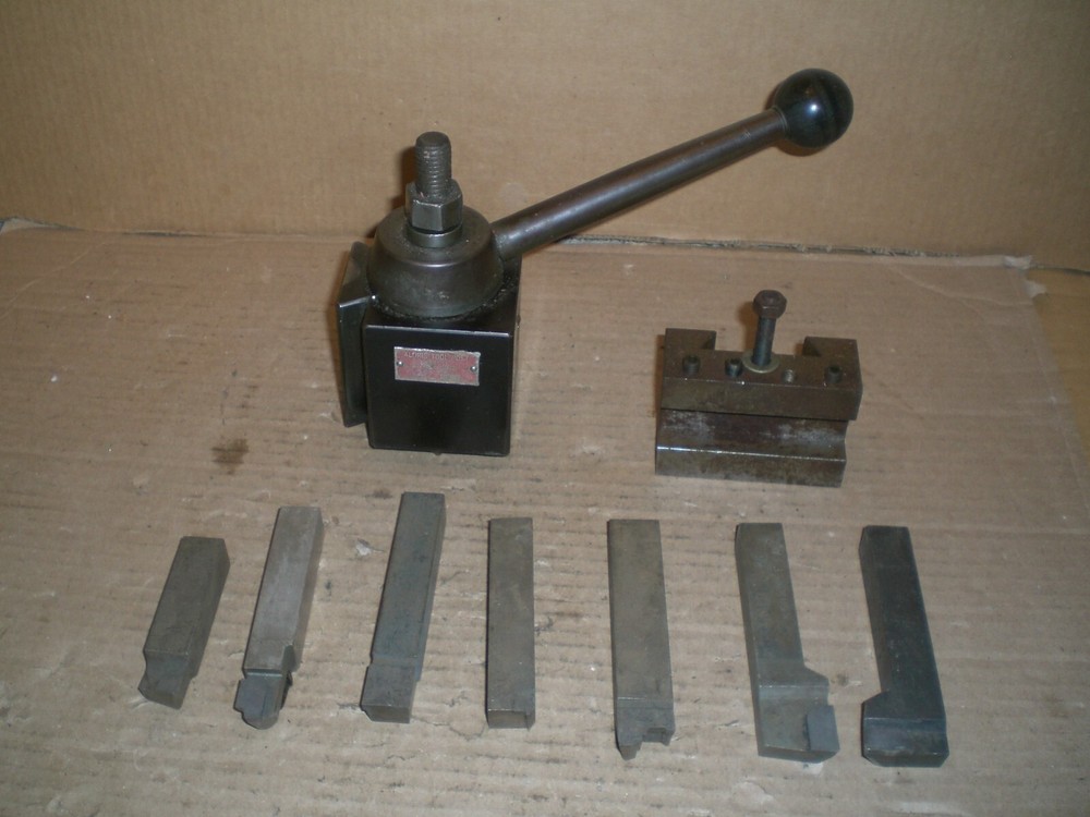 Genuine Aloris CX tool post with 1 tool holder 7 cutting bits