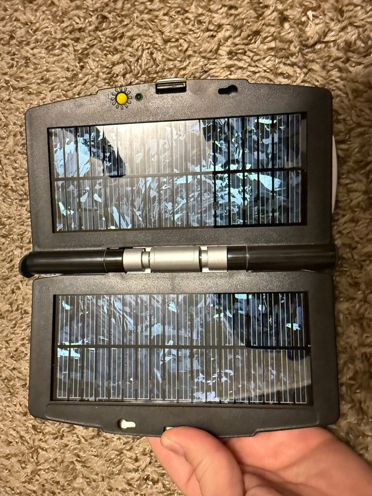 iSun EXECUTIVE SILVER SOLAR PANEL CHARGER by ICP Global Technologies. CHARGES.