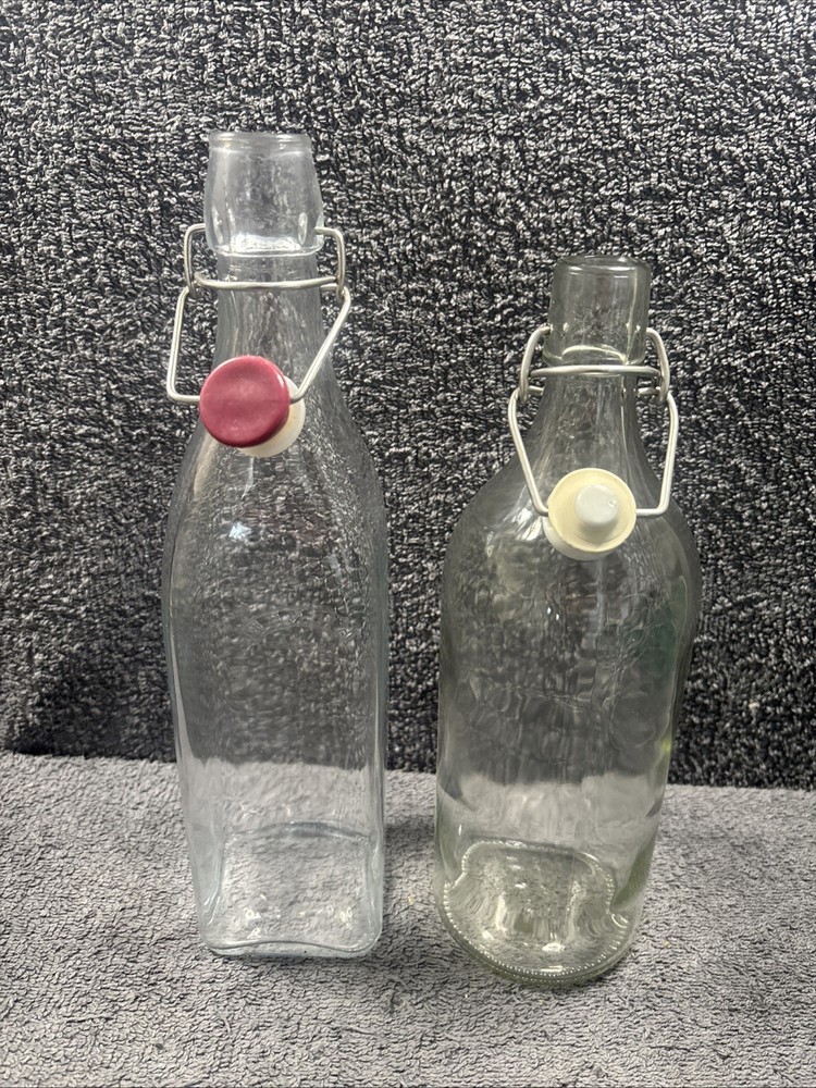 2 Old Fashioned Style Bottles With Flip Lids