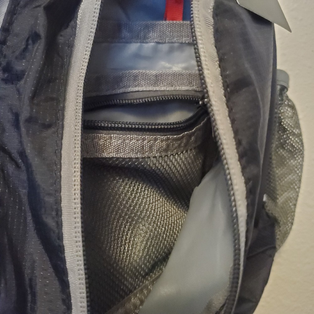 Waterfly Sling Pack - Black Gray Adjustable Strap Pockets Zippered NWT