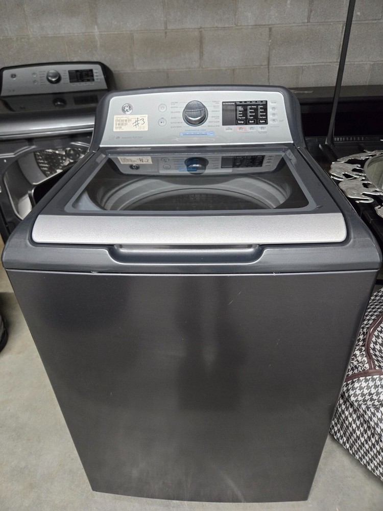 GE top load washer and dryer combination. Lightly used.