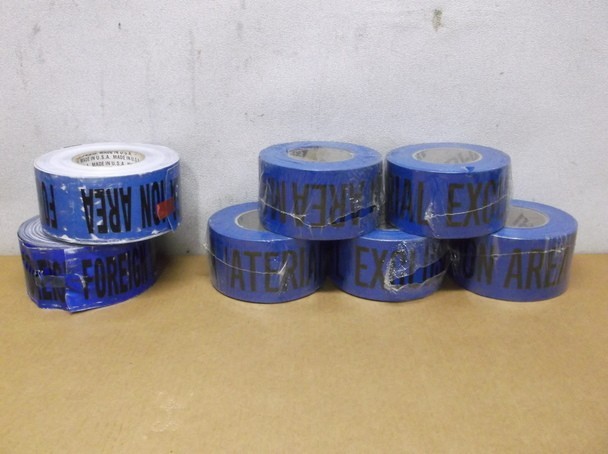 7 Blue Caution Tape Rolls That Read "Foreign Material Exclusion Area"