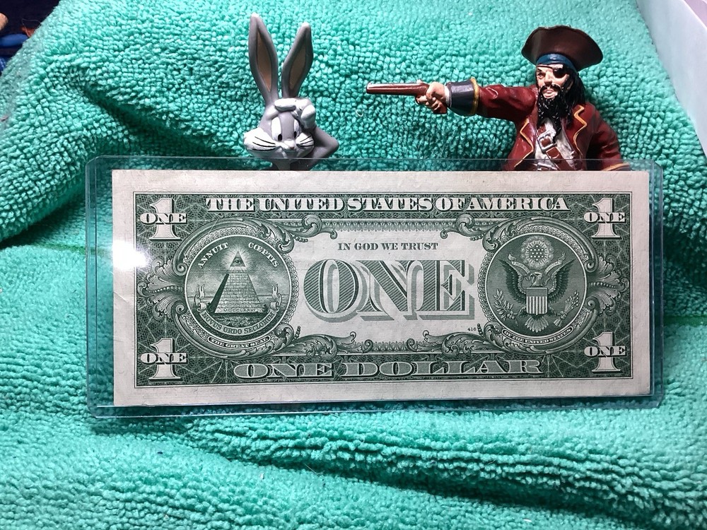 1957 A SILVER CERTIFICATE UNCIRCULATED in RIDIG HOLDER