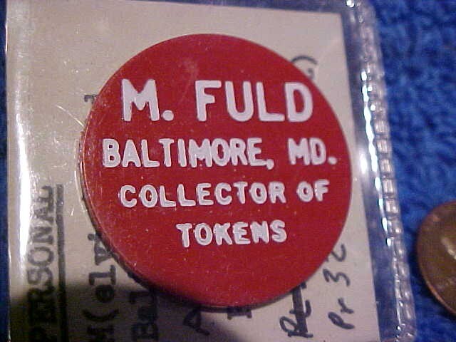 M. Fuld Baltimore Md Collector plastic token Red