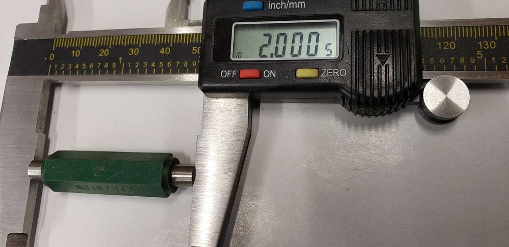 2-Piece Imported 0 -12" Electronic & Dial Calipers in Boxes. Both Working.