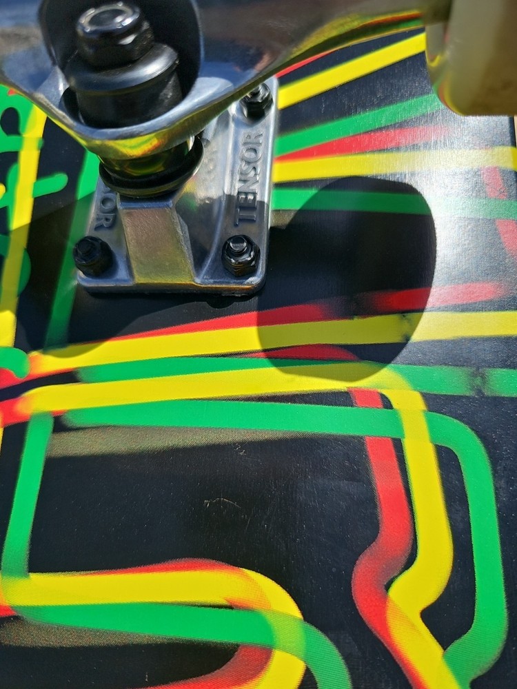 Almost Skateboards Complete Rasta Neon Logo Deck Tensor Trucks