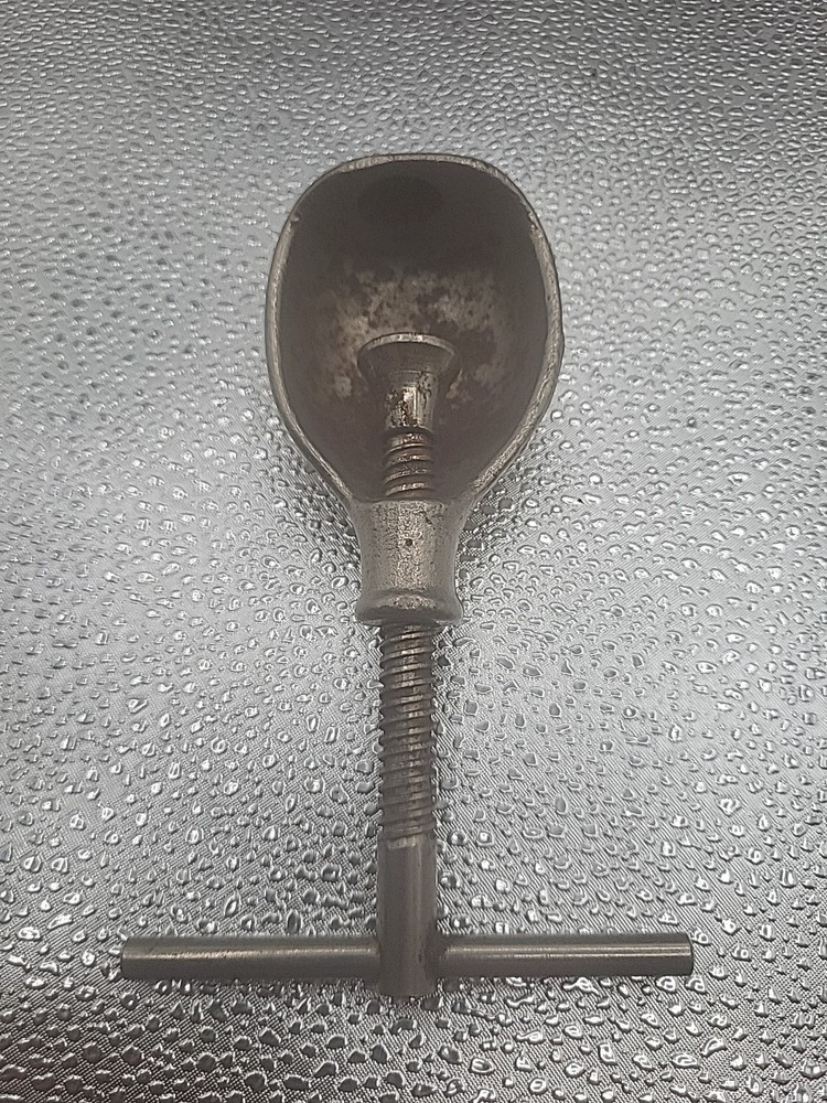 Vintage nut cracker Cast Iron T Handle Screw Shell Design