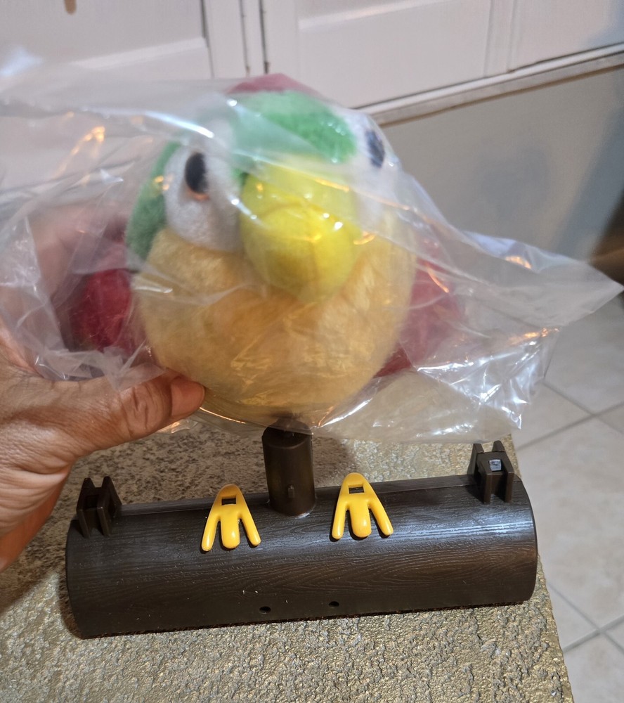Singing Parrot On Perch