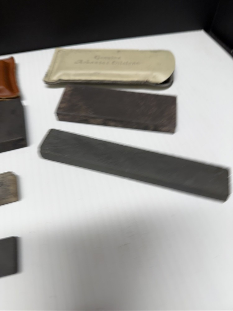 Six Sharpening Stones Some With Sheaths + Honing Oil (almost Empty)