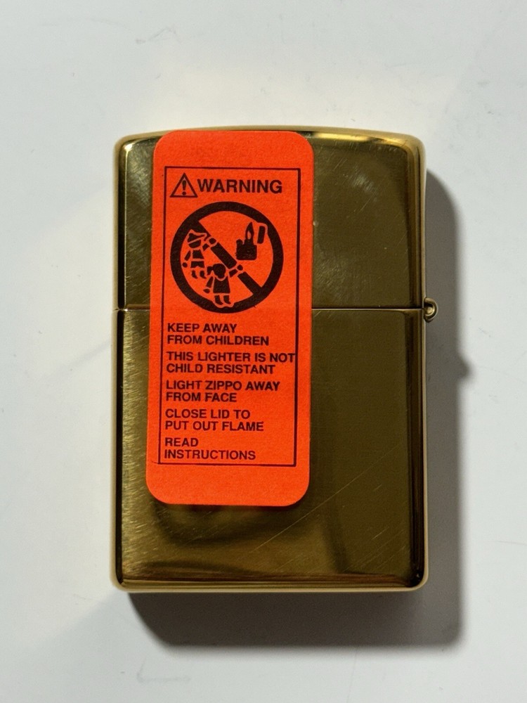 Zippo Gold Tone Peace on Earth Lighter