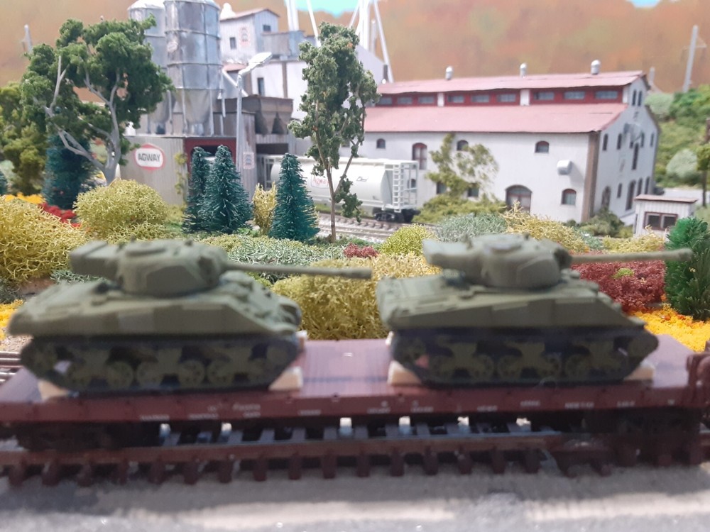 n scale military tanks for flat car load.