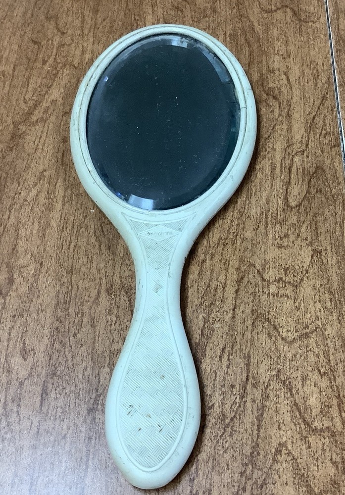 Vintage Hand Held Vanity Mirror .