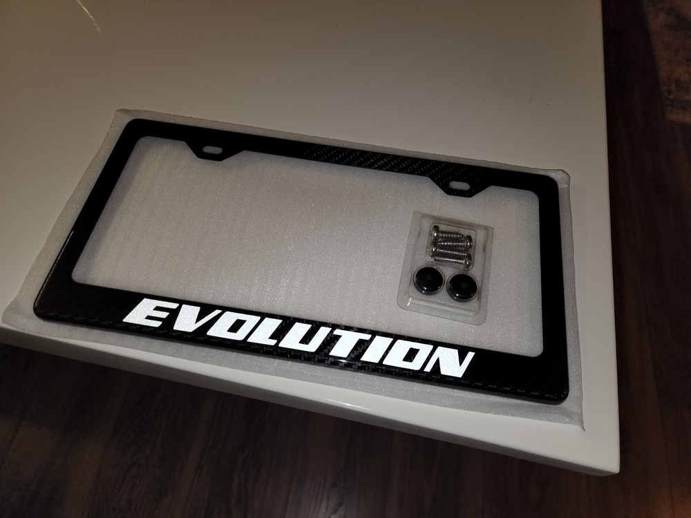 Reflective White Lacer Evo / Evolution 100% Carbon Fiber License Plate Frame
