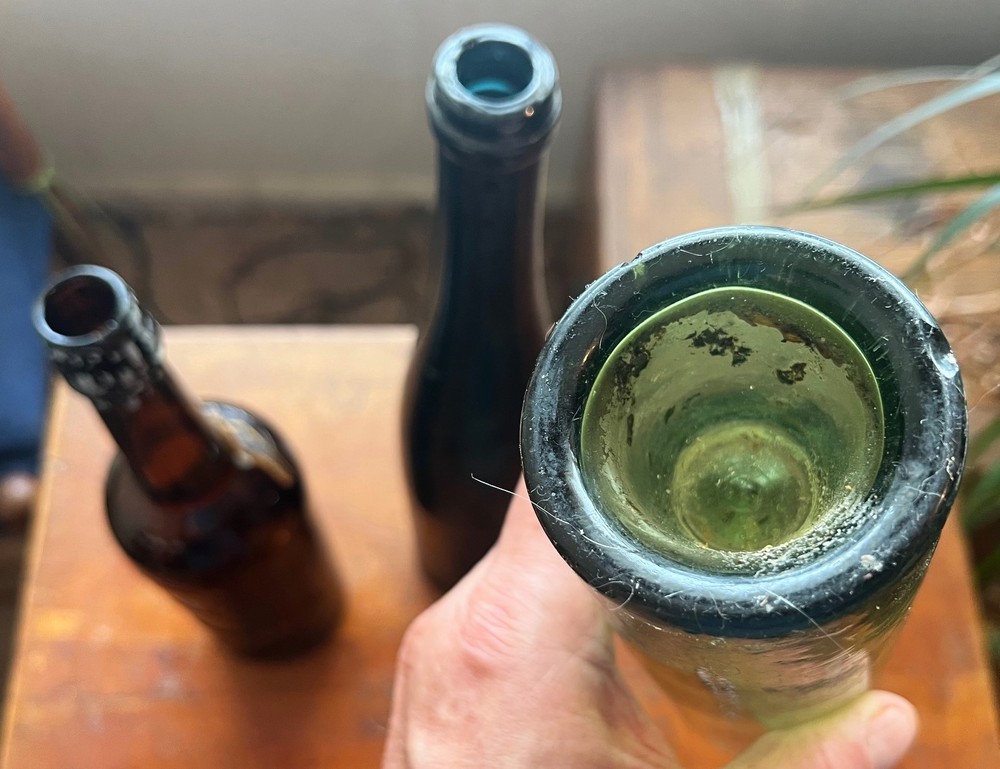 3 antique bottles