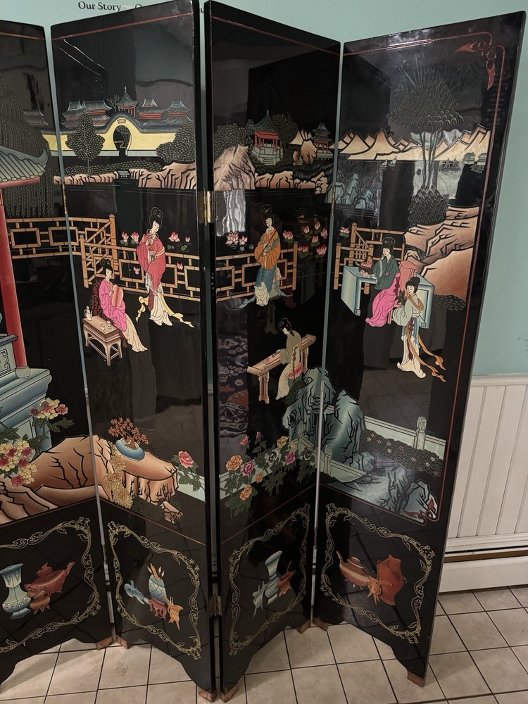vintage Chinese four-panel room divider featuring black lacquered panels