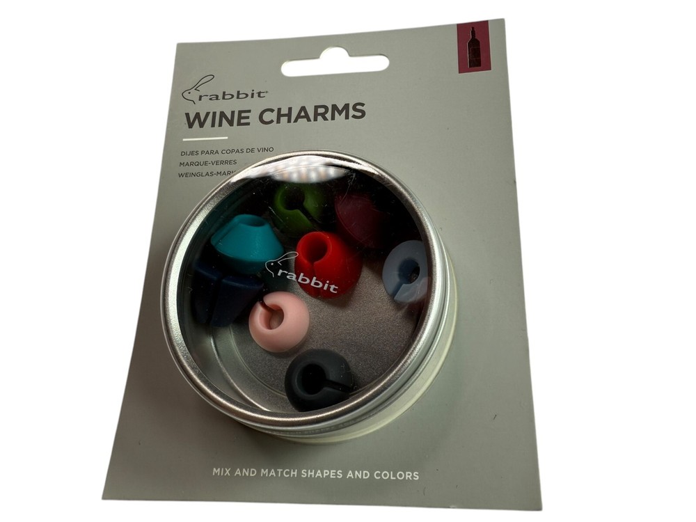 New in Box Rabbit Wine Charms Silicone Rubber. Includes 8 Charms in Container