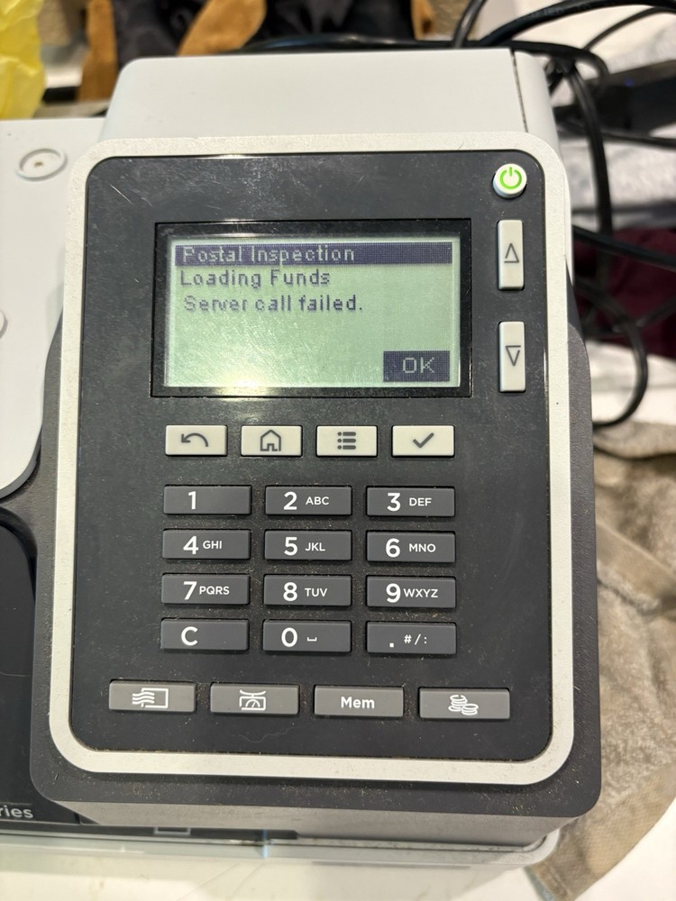 Quadient IX-1 Series Postage Printer.