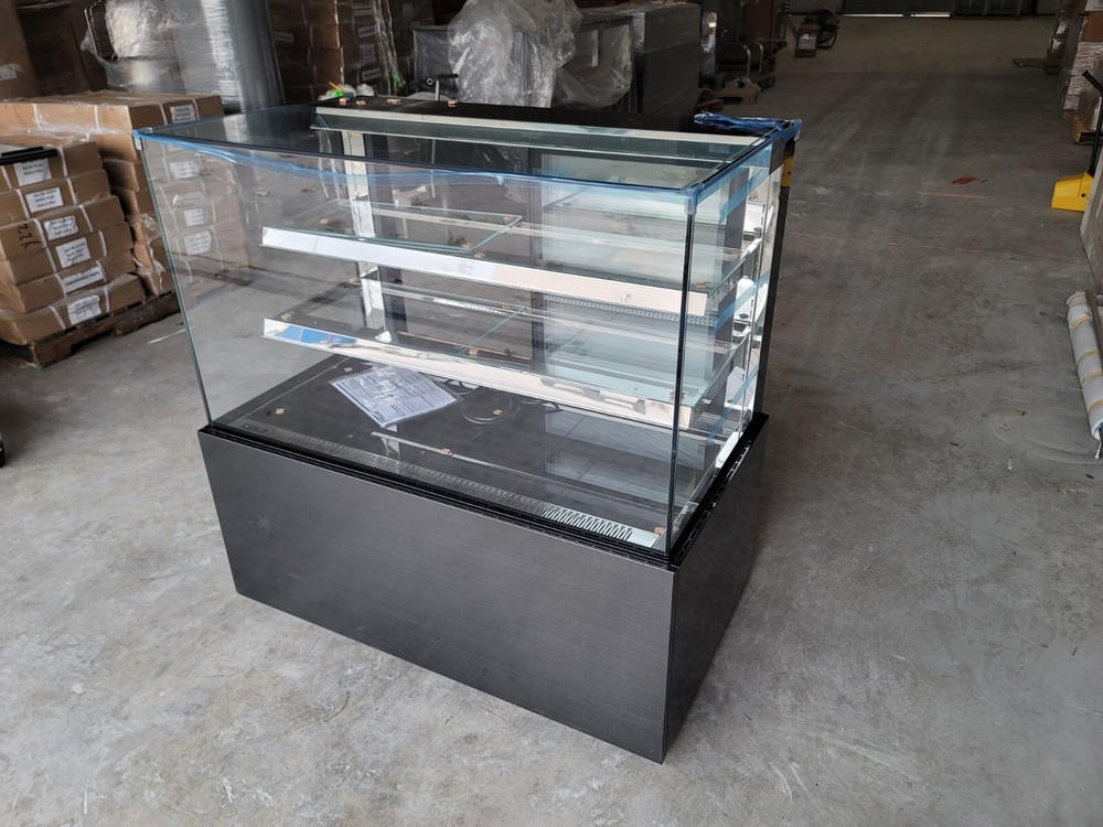 Multilevel refrigerated display case. Dessert, pastry, bakery display.