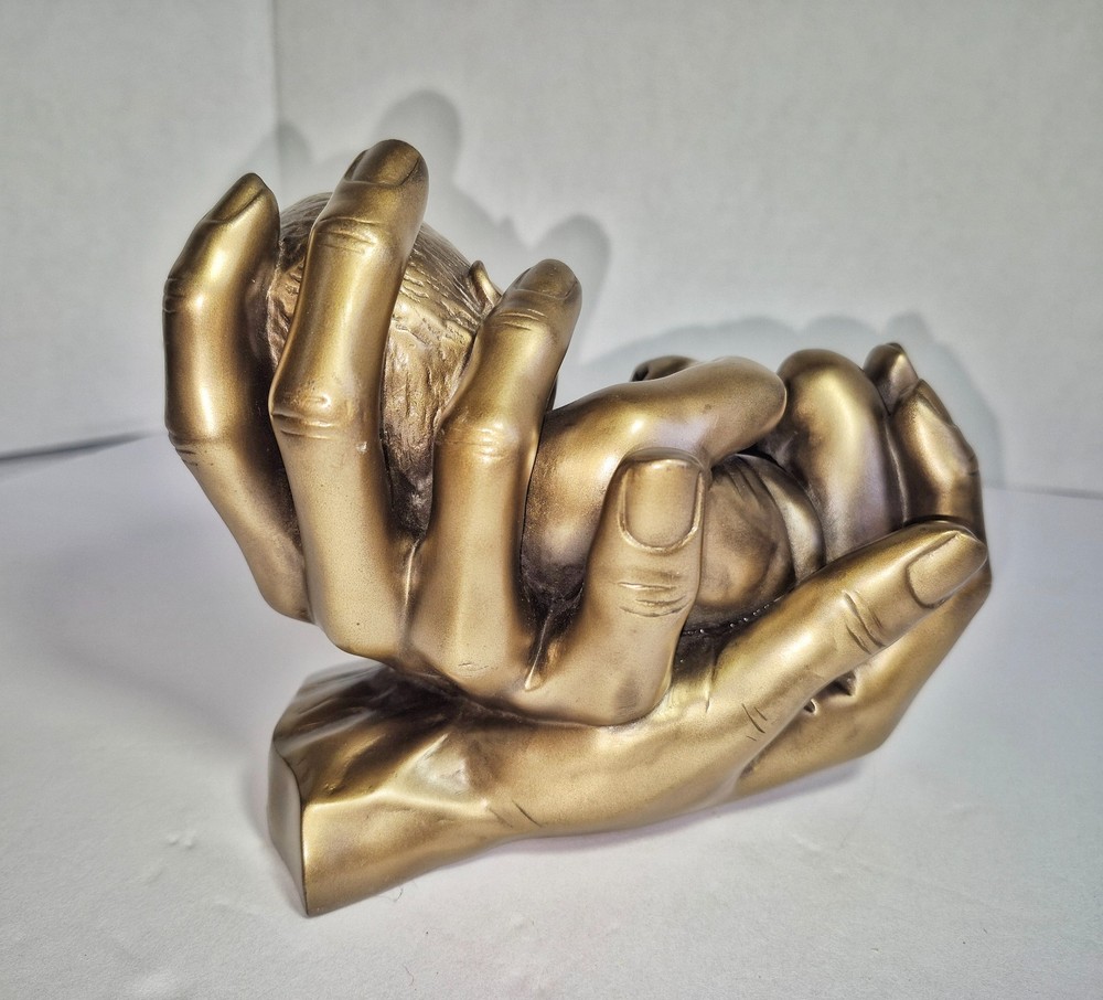 Baby in Hands Cold Cast Resin Statue