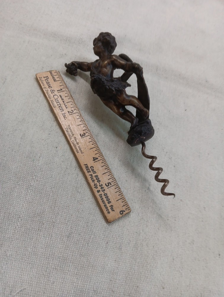 COLLECTABLE BRONZED CORKSCREW WITH WINGED CHERRUB HANDLE