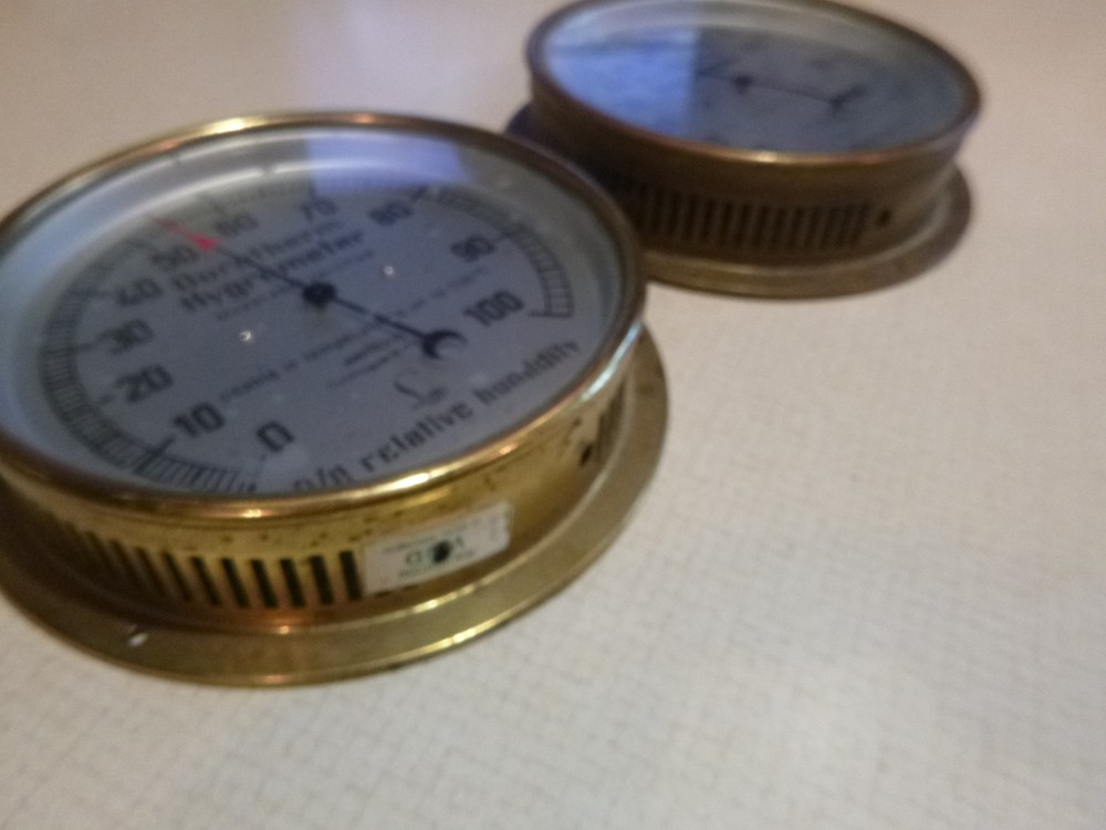 TWO VINTAGE BRASS HYGROMETER GAUGES