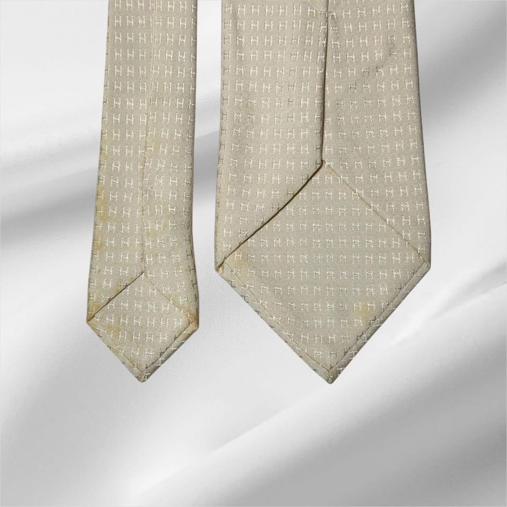 Excellent condition HERMES Tie H Pattern Fasone Solid Ivory White