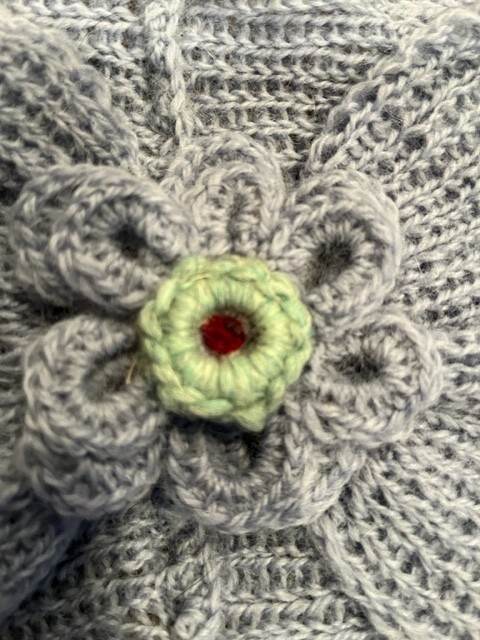 Hand knitted gloves and winter headbands