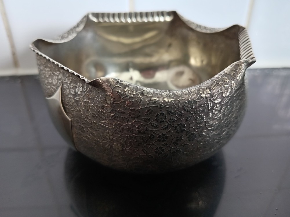 Silver plated very ornate rose bowl.