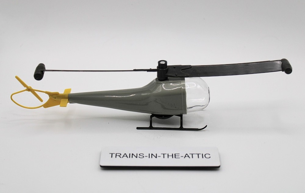 LIONEL 6819 STATIC LOAD NON FUNCTIONING  HELICOPTER  NEW W/BROWN BLADE.